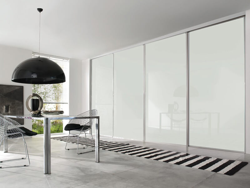 Schiebetür FLY Duo als Trennwand zwischen 2 Räumen, Füllung Glas Weiß
